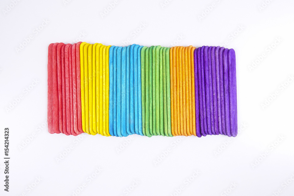Colourful wooden sticks on white background Colourful wooden sticks on white background