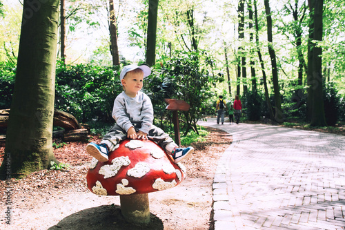 Family is having fun at amusement park Efteling, Netherlands. photo