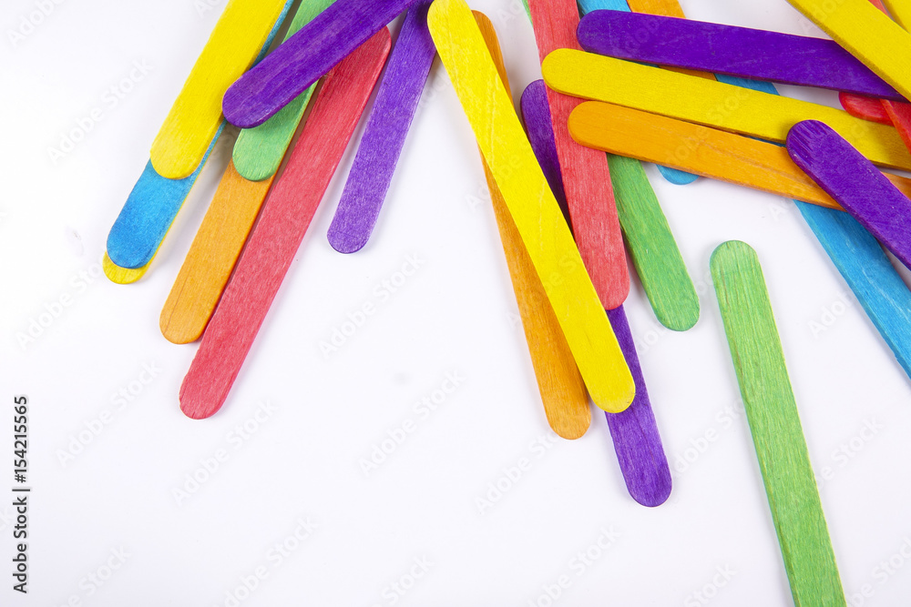 Colourful wooden sticks on white background Colourful wooden sticks on white background