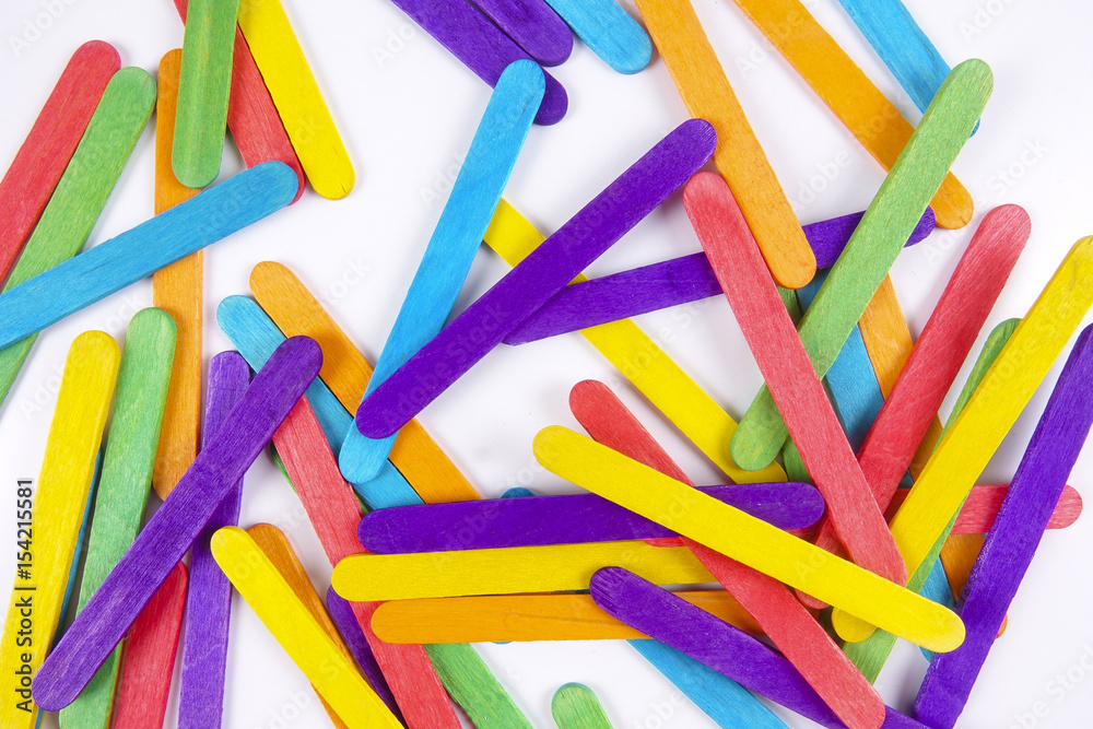 Colourful wooden sticks on white background Colourful wooden sticks on white background