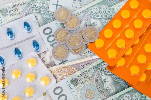 Pills and polish zloty bills