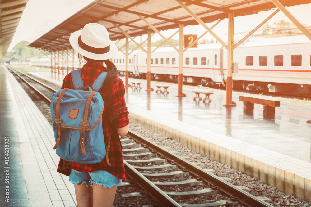 beautiful young asian girl traveling alone at train station, vintage tone beautiful young asian girl traveling alone at train station, vintage tone