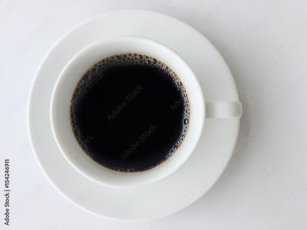 top view of black coffee in white cup with white background top view of black coffee in white cup with white background