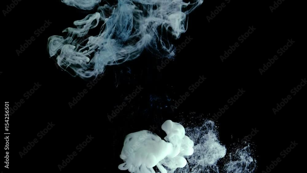 Blue and white ink in water shooting with high speed camera, slow motion Blue and white ink in water shooting with high speed camera, slow motion