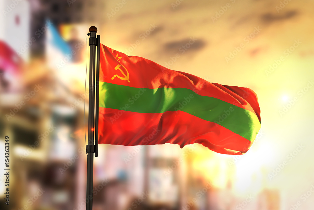 Obraz na płótnie Transnistria Flag Against City Blurred Background At Sunrise Backlight w salonie