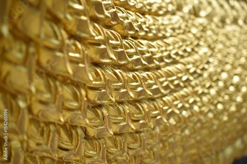 closeup gold dragon scale statue