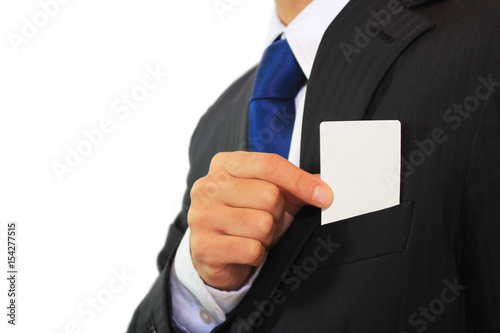 白いカードを持つビジネスマン businessman showing his blank white card