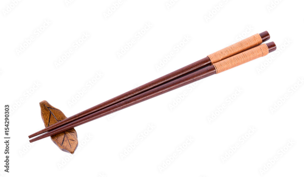 Wooden pairs of chopsticks on white background Wooden pairs of chopsticks on white background