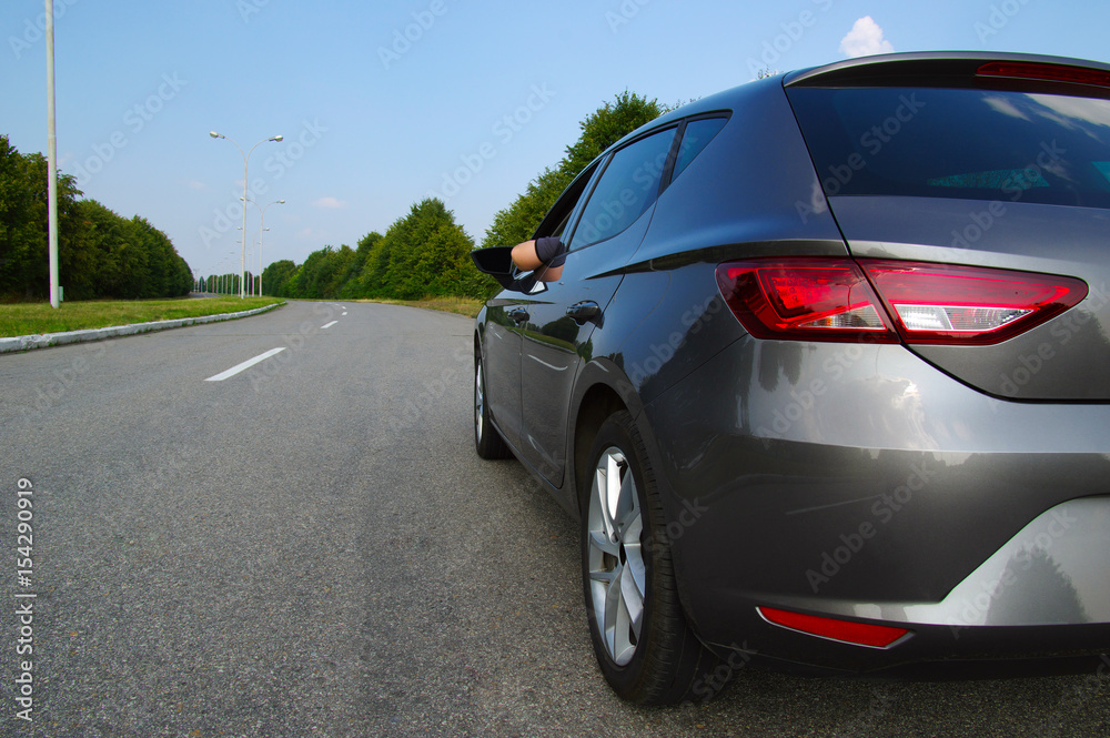 Car on asphalt road in nature