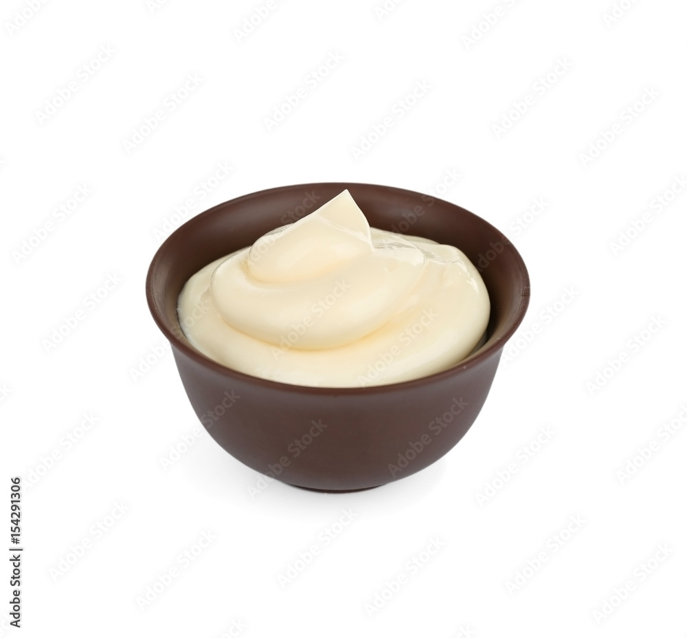Bowl of delicious creamy sauce isolated on white Bowl of delicious creamy sauce isolated on white