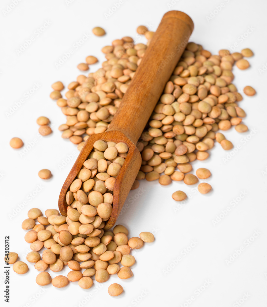 uncooked lentils on white, (large depth of field, taken with tilt shift lens) uncooked lentils on white, (large depth of field, taken with tilt shift lens)