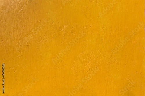 The orange color wall paint texture background 