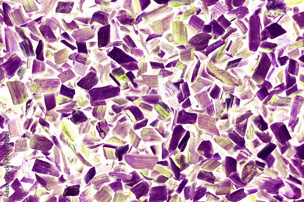 Multicolored crystals on a white background. Variegated background with violet crystals. Multicolored crystals on a white background. Variegated background with violet crystals.