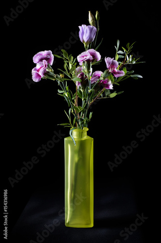 A bouquet of flowers on a black background