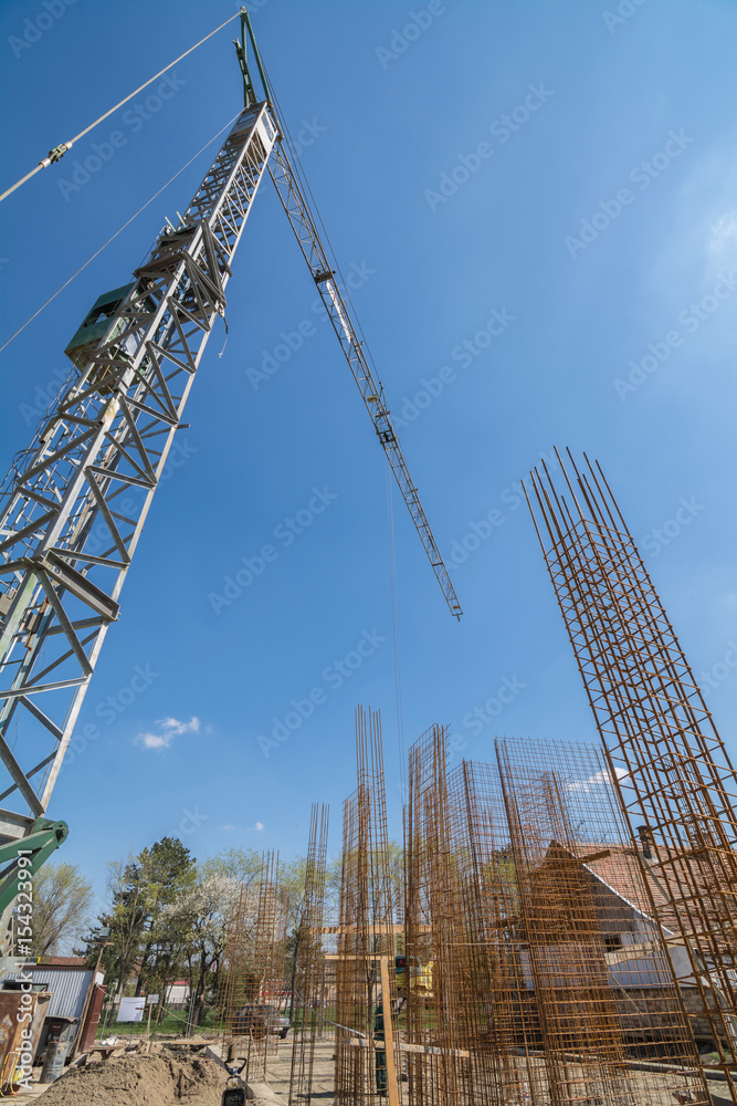 Fototapeta premium Building crane at construction site