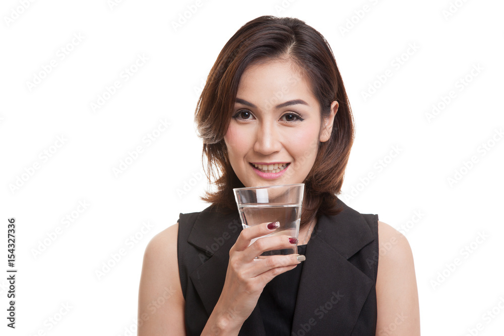 Young Asian woman with a glass of drinking water. Young Asian woman with a glass of drinking water.
