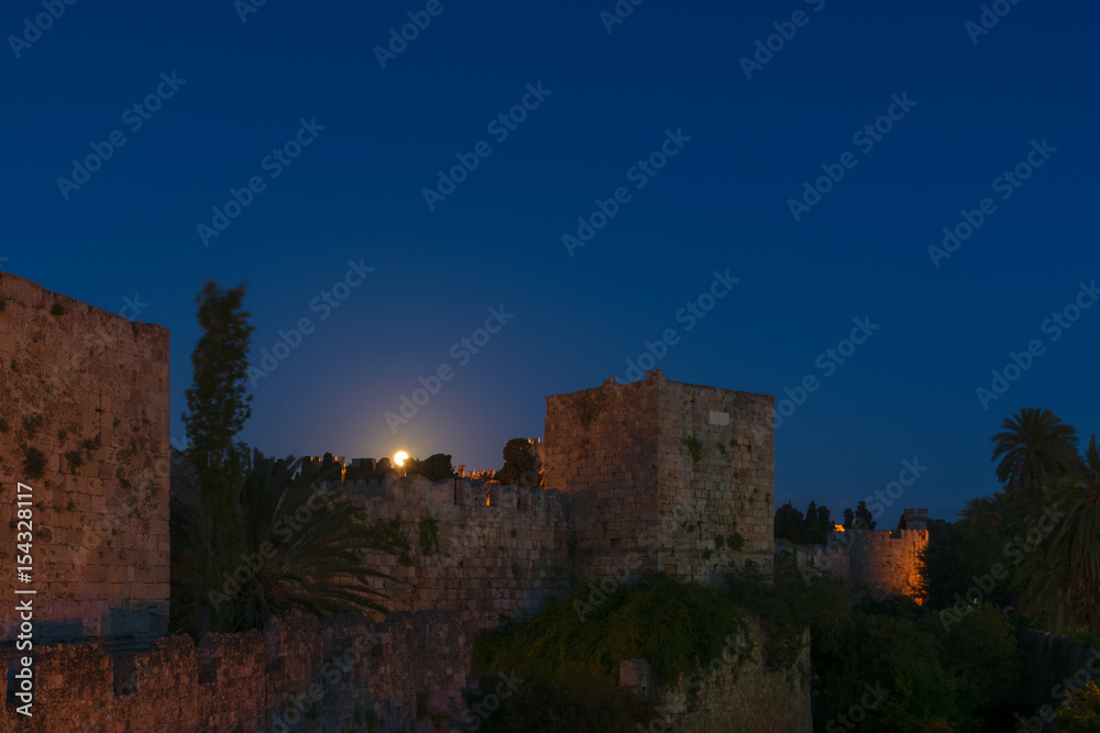 Moon set at the old town of Rhodes. Greece. Europe.