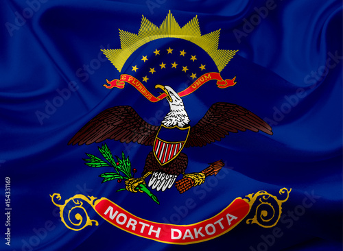 Flag of North Dakota, USA with waving fabric texture