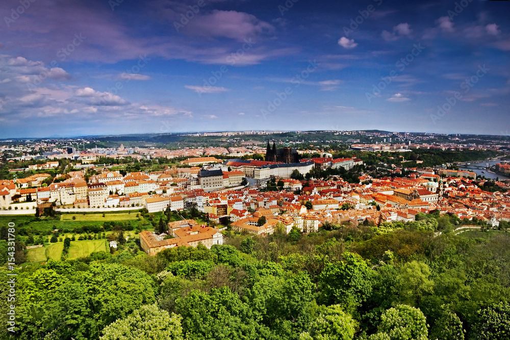 view to Hradcany with Prague castle and St. Vitus Cathedral from Petrinska rozhledna tower in sping Prague in Czech republic