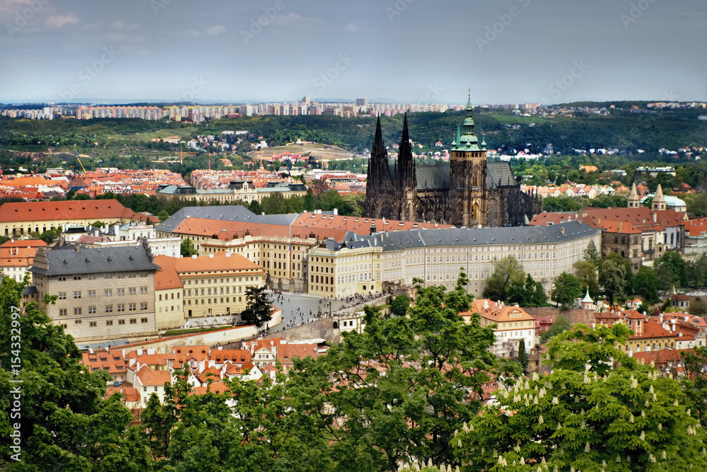 Fototapeta premium view to Hradcany with Prague castle and St. Vitus Cathedral from Petrinska rozhledna tower in sping Prague in Czech republic