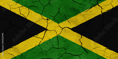 Flag of Jamaica, with dried soil texture
