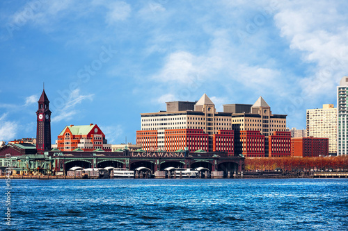 Hoboken, New Jersey waterfront and skyline viewed from the Hudson River. The historic Lackawanna train terminal, built 1907, is seen in the foreground.