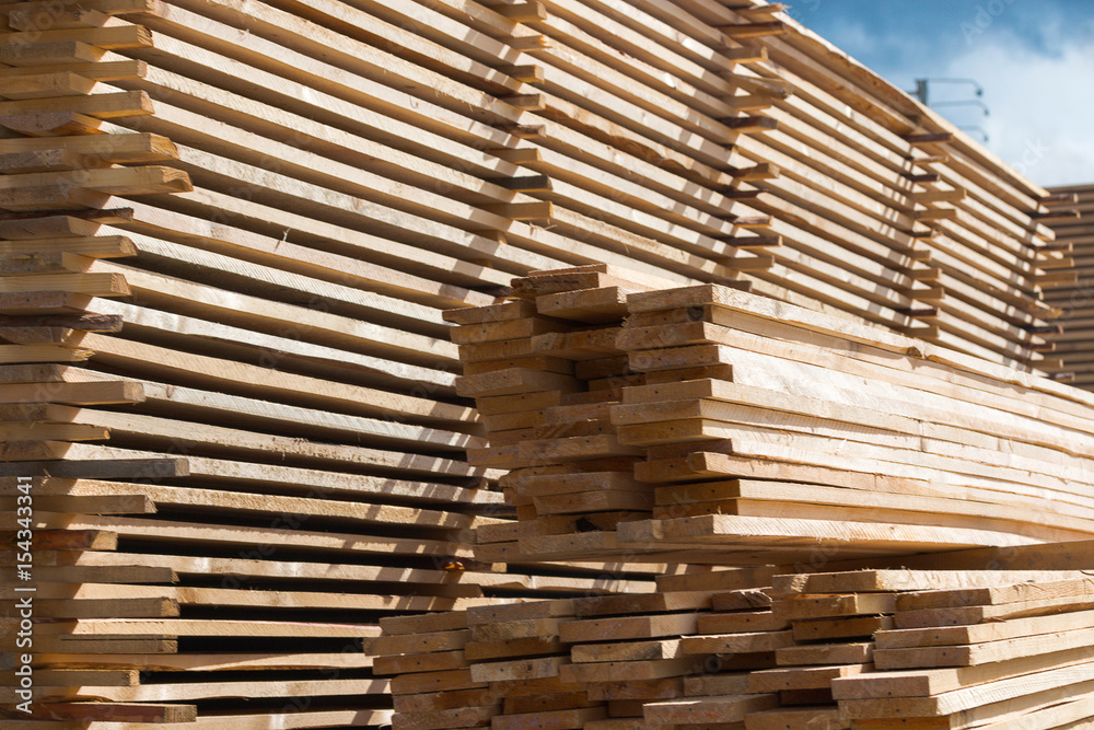 Lumber, boards and timber lie in a pile Lumber, boards and timber lie in a pile
