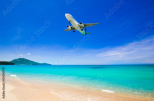 Thailand. Sea background. Mai Khao aircraft over water