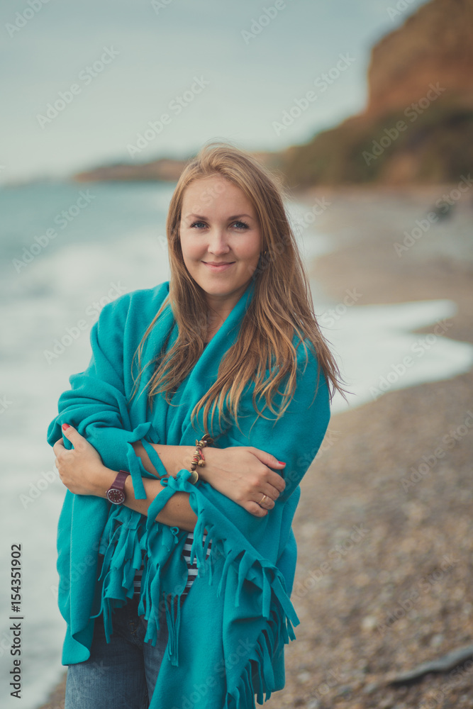 Happy woman enjoying beach relaxing joyful in summer spring