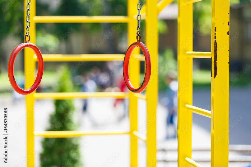 Gymnastic rings at the new city kids playground Gymnastic rings at the new city kids playground
