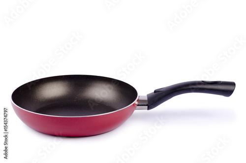 Red frying pan isolated on white