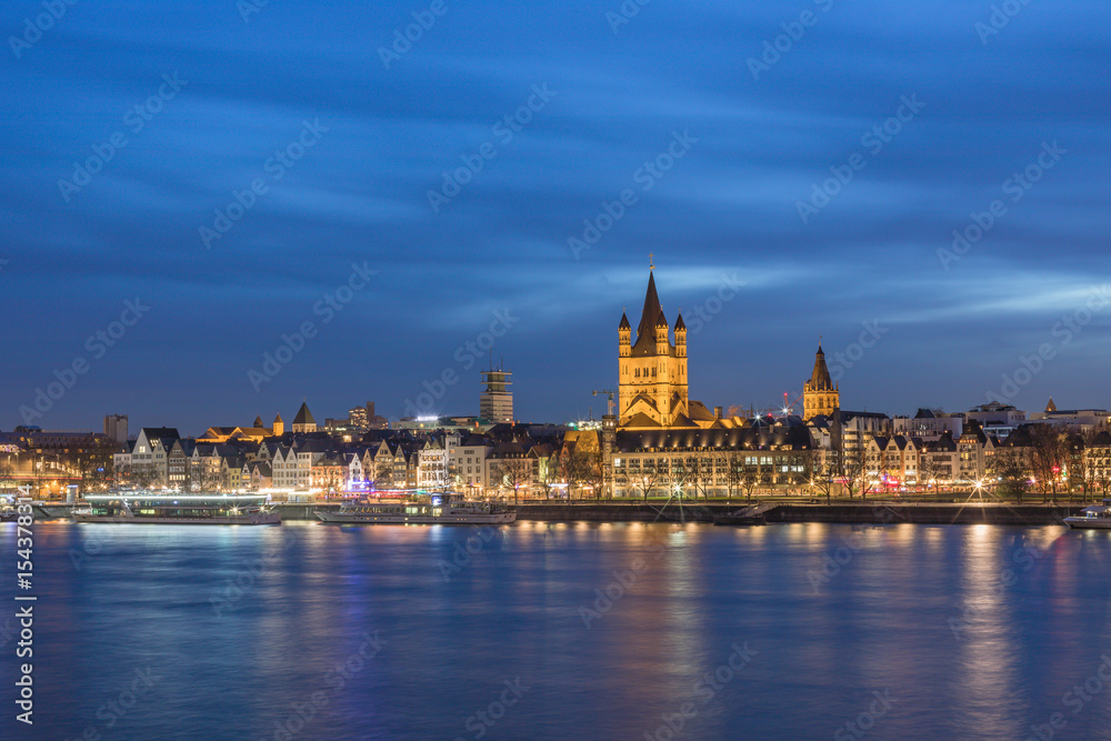 Great St. Martin Church And Tower Of City Hall Cologne In The Evening Blue Hour / Germany