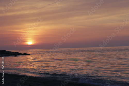 Colorful sky and the sea reflected in sunset. sunset on the sea with the sky in the clouds Turkey beach