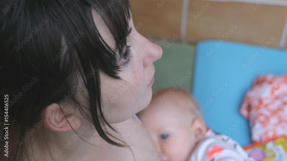 Mother nursing baby Mother nursing baby