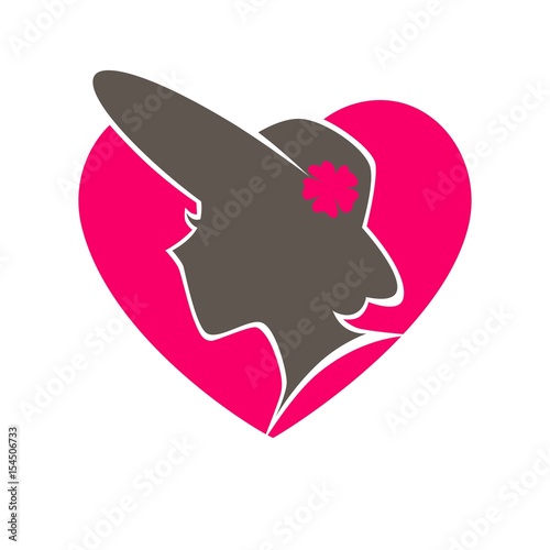 Woman in hat with broad brims in heart emblem