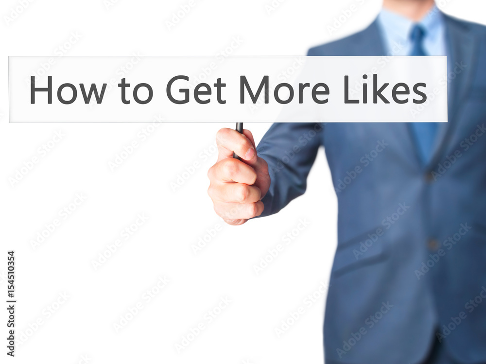 How to Get More Likes - Businessman hand holding sign How to Get More Likes - Businessman hand holding sign