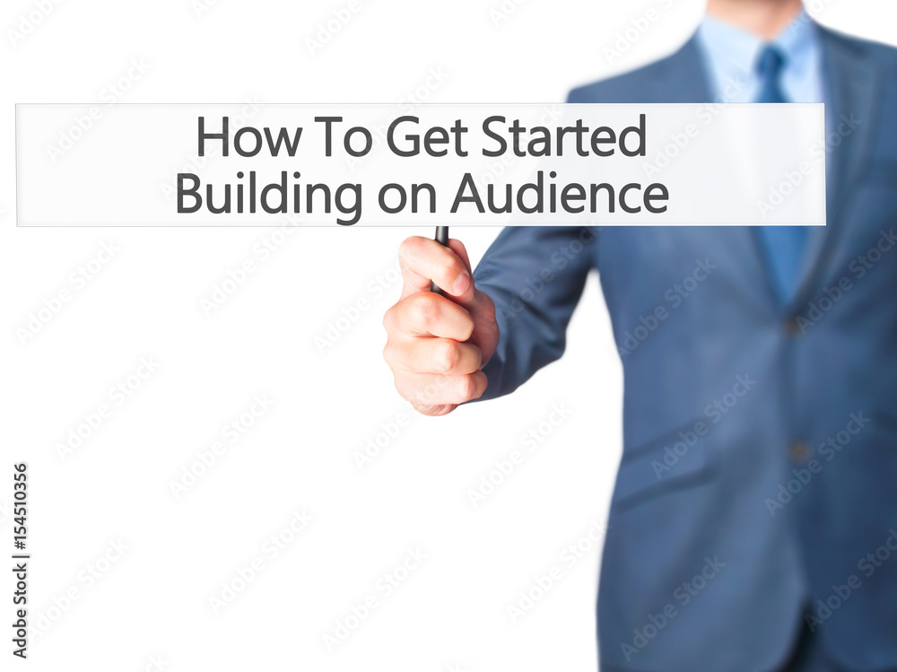 How To Get Started Building on Audience - Businessman hand holding sign How To Get Started Building on Audience - Businessman hand holding sign