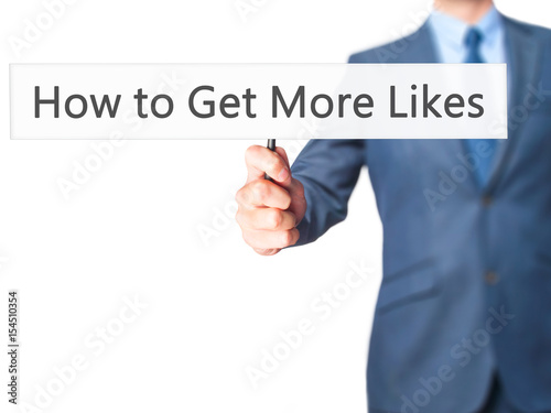 How to Get More Likes - Businessman hand holding sign