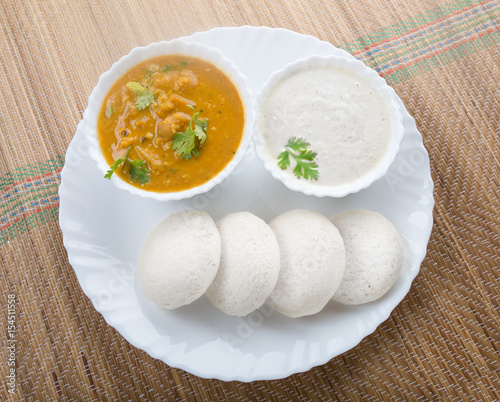 south Indian food idly with sambar and chutney photo