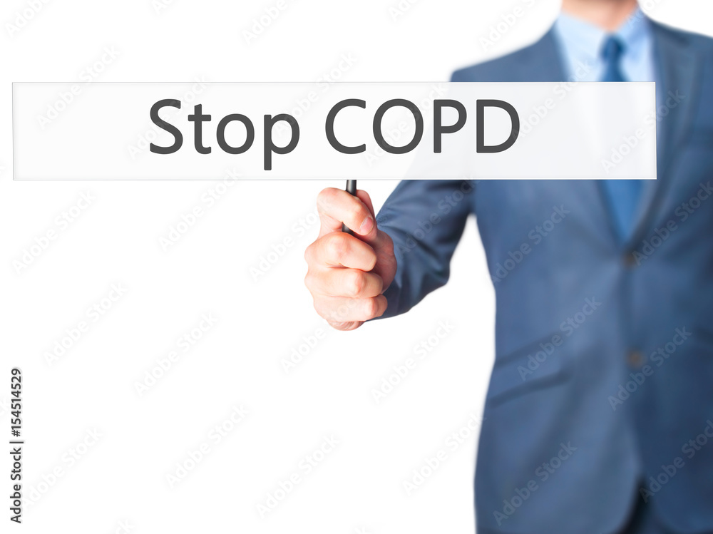 Stop COPD - Businessman hand holding sign Stop COPD - Businessman hand holding sign