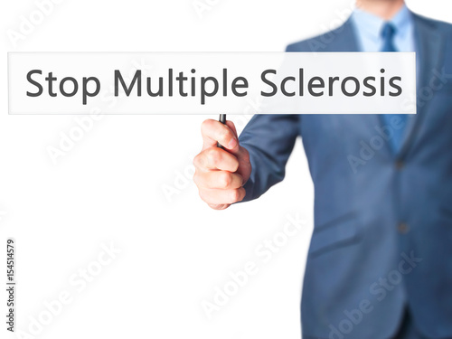 Stop Multiple Sclerosis - Businessman hand holding sign