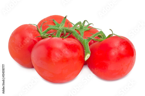 Branch of the ripe red tomatoes closeup