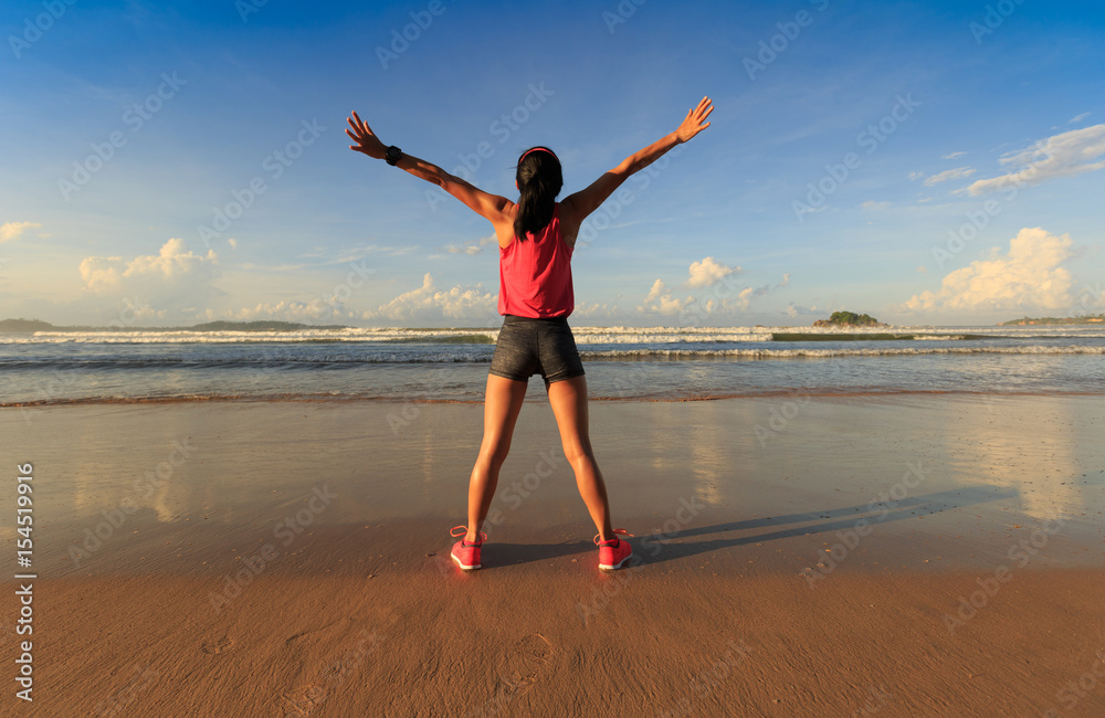 young healthy lifestyle young woman open arms on sunrise seaside beach young healthy lifestyle young woman open arms on sunrise seaside beach