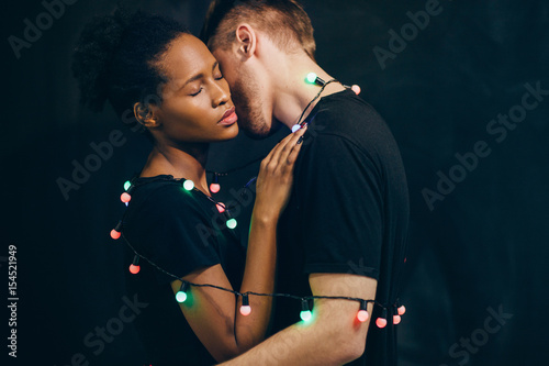 Obraz na plátně Young interracial couple, tenderness and love