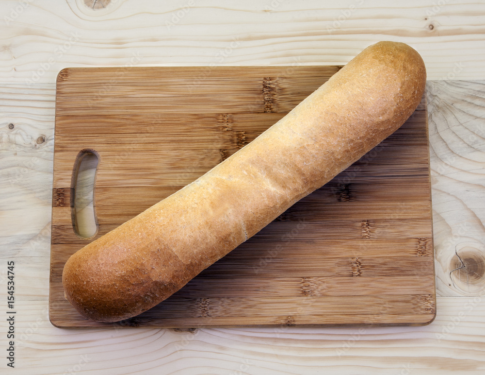 Whole loaf of bread plain, natural and simple long bread baton