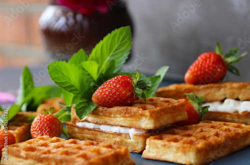 Wafers, strawberries and mint