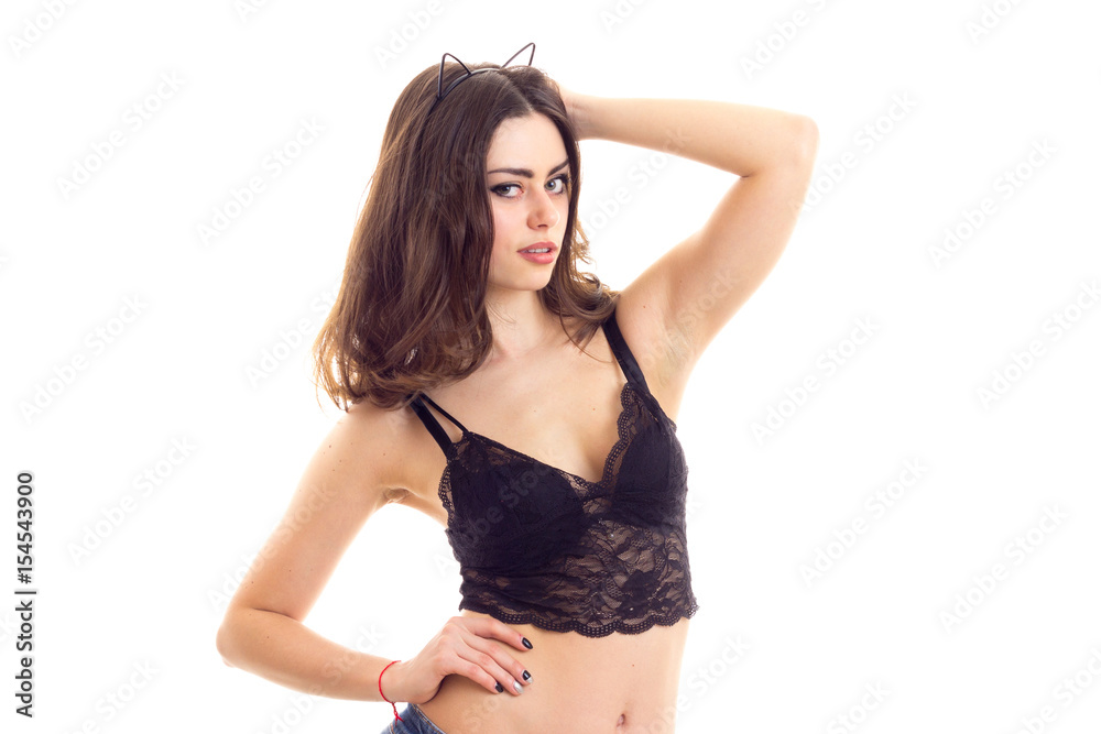 Young woman in black lingerie and denim shorts - obrazy, fototapety, plakaty 
