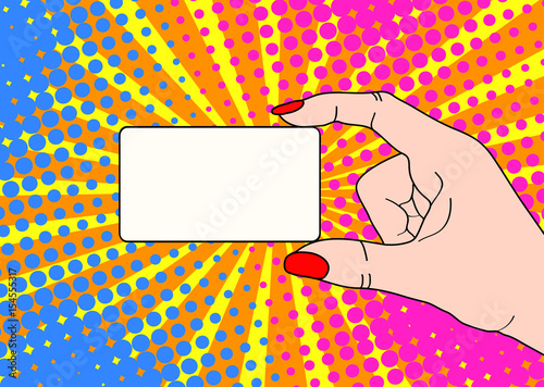Female hand with holding a card on bright dot background in pop art comic style. Hand drawing vector illustration