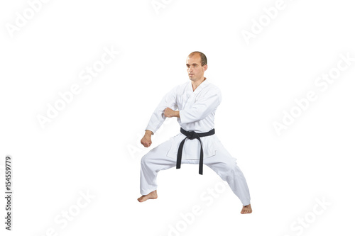 Blocks hands trains an athlete on a white background