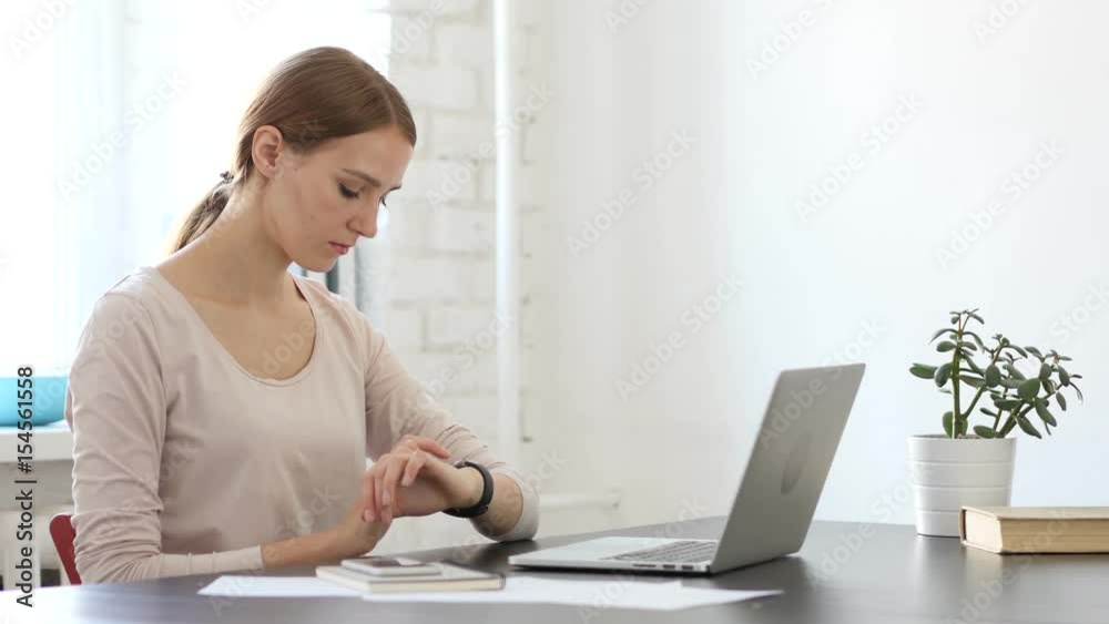 Creative Woman Using Smartwatch, Browsing Emails Creative Woman Using Smartwatch, Browsing Emails